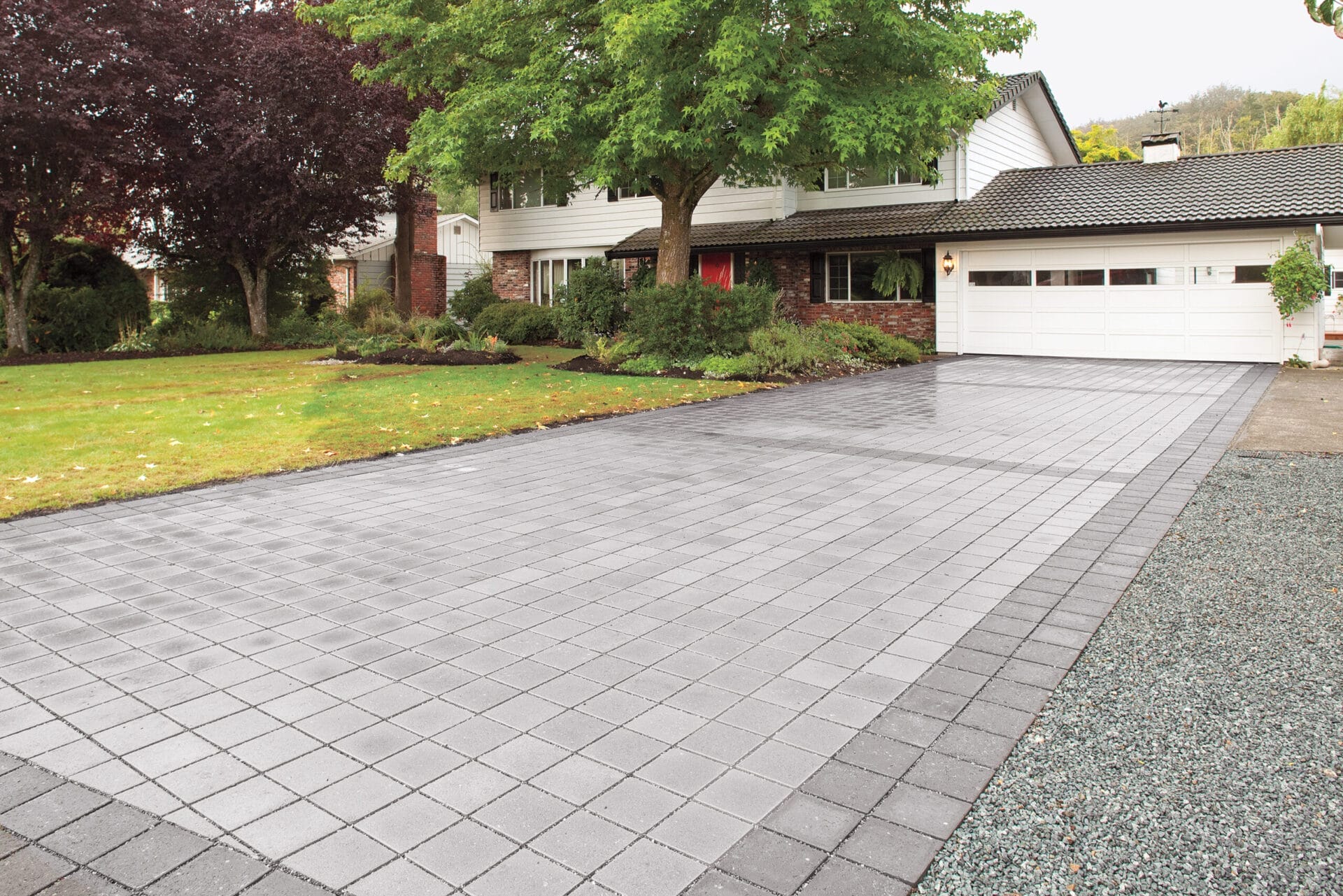 Permeable paver driveway allows rain water to soak through.